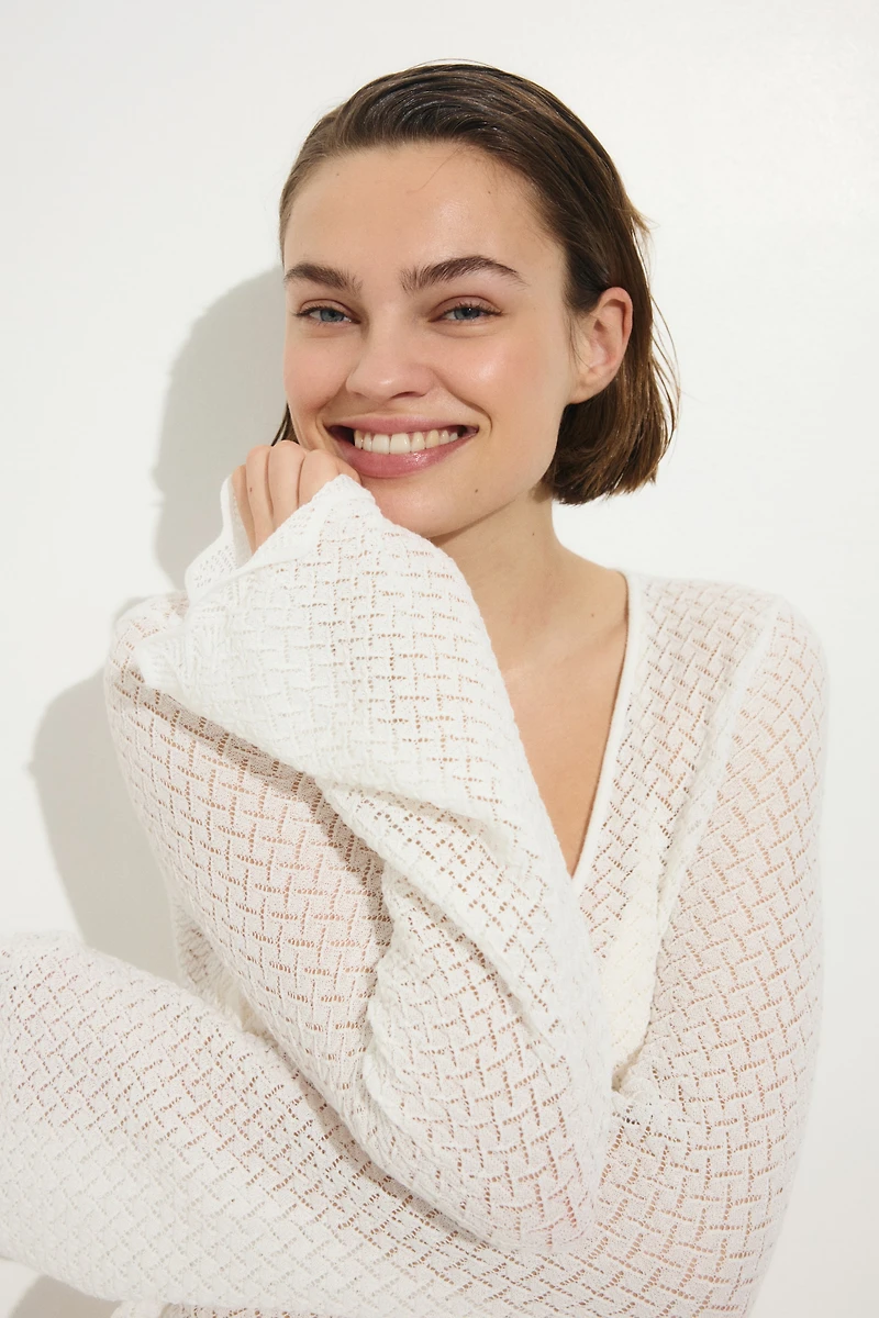 Robe de plage en tricot pointelle