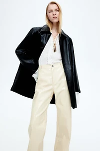Pantalon en tissu enduit