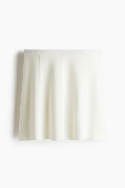 Jupe évasée en fin tricot