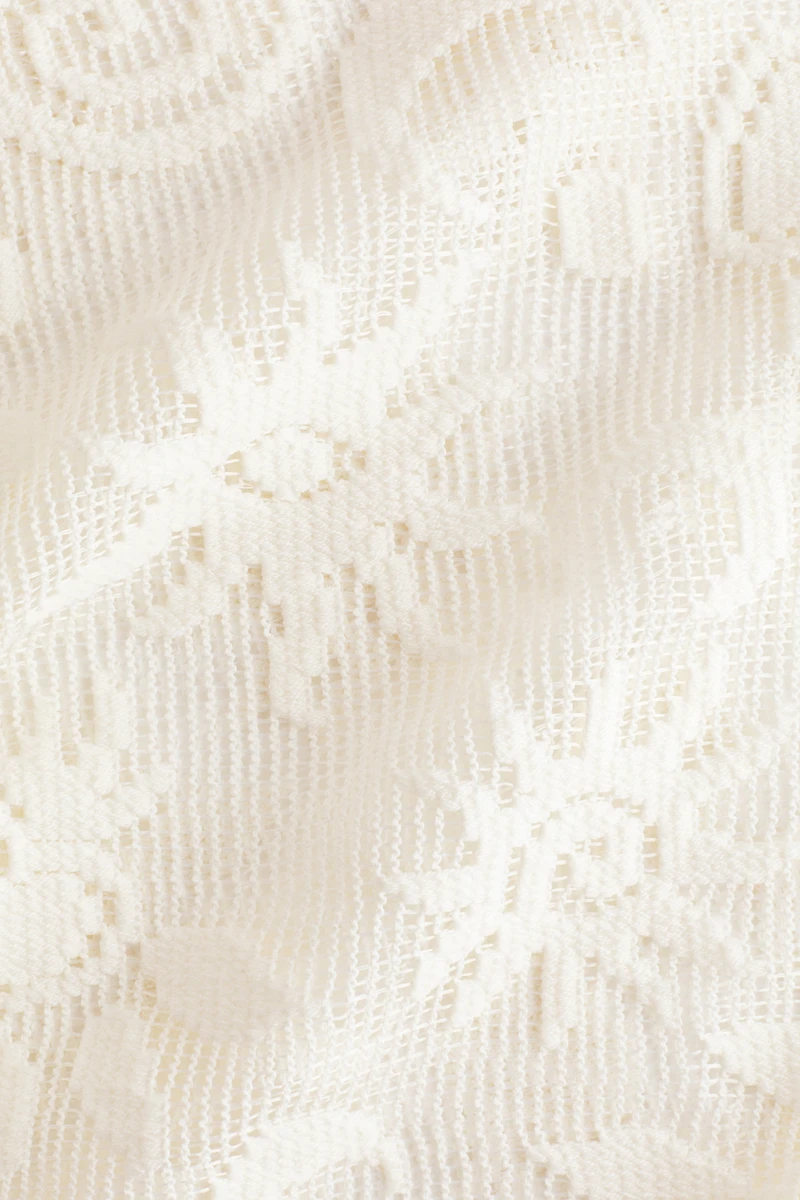 Pantalon en résille avec motifs