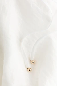 Blouse à manches volantées avec basque