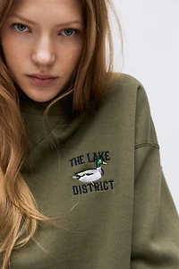 Sweatshirt with Text Motif