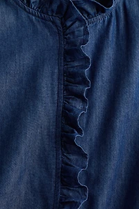 Blouse volantée en denim