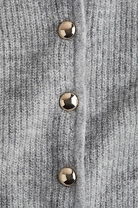 Gilet péplum en tricot côtelé