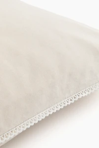 Taie d'oreiller en coton avec détails brodés