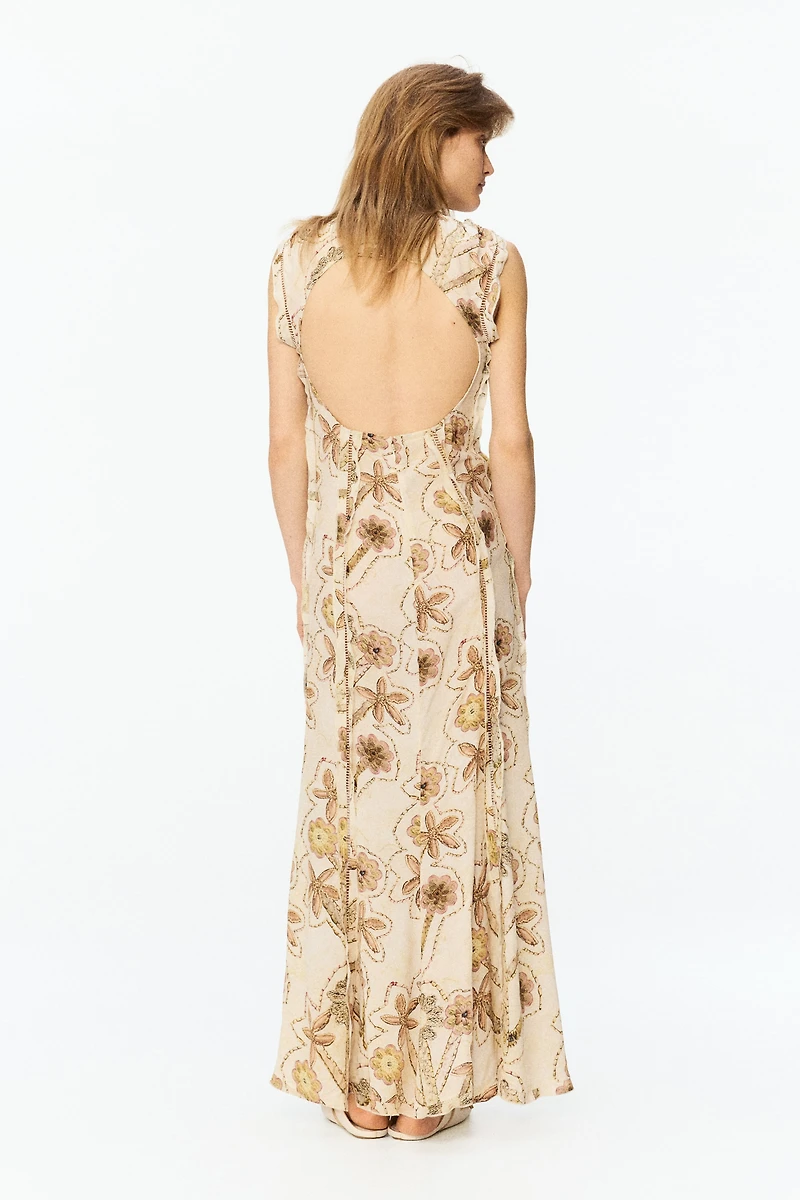 Robe plissée à imprimé fleuri et dos ouvert