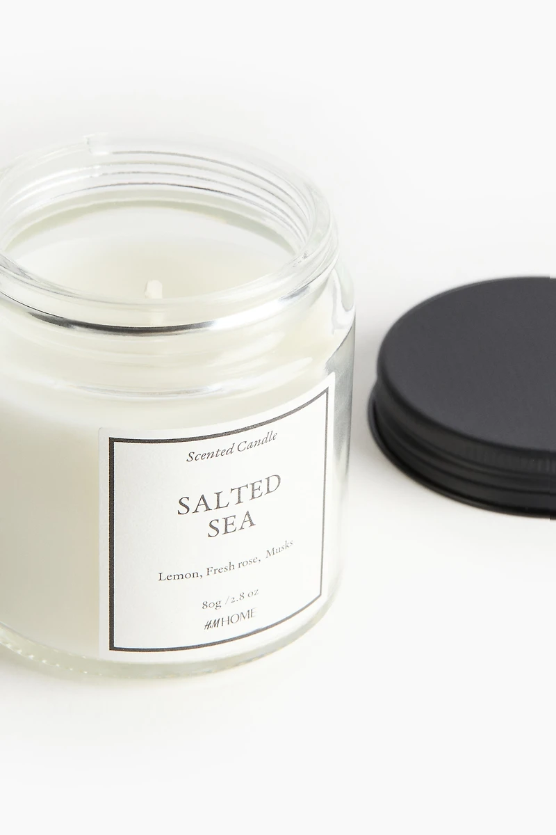 Bougie parfumée dans un pot en verre