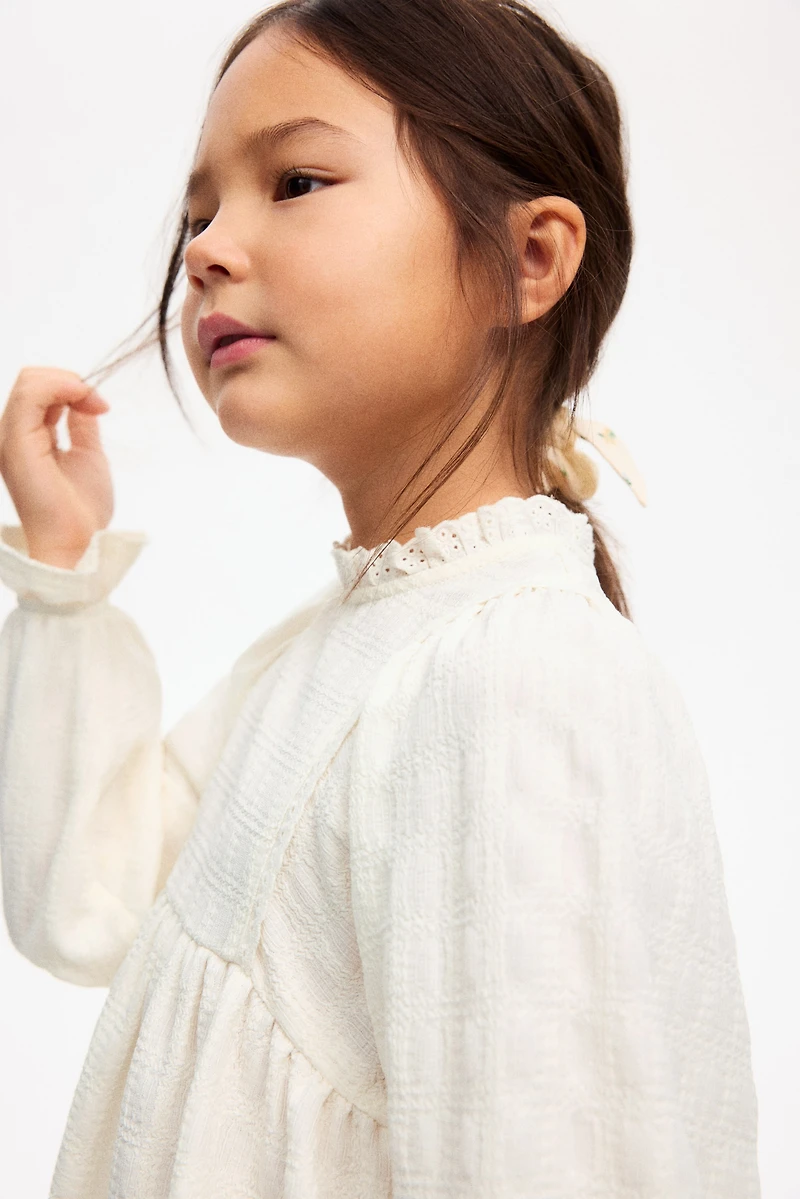 Blouse en jersey texturé