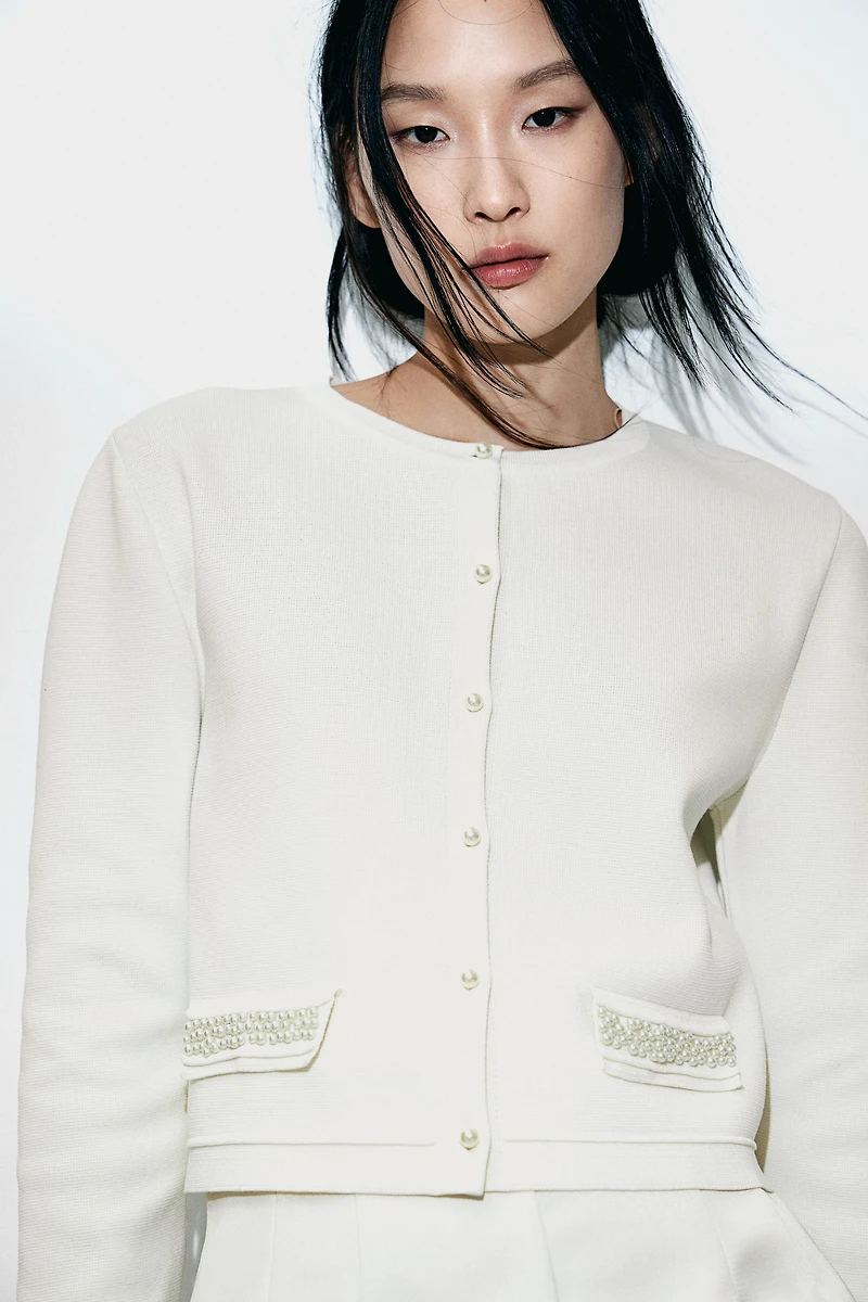 Gilet avec perles de fantaisie