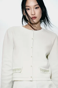 Gilet avec perles de fantaisie
