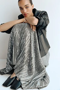 Jupe plissée à sequins