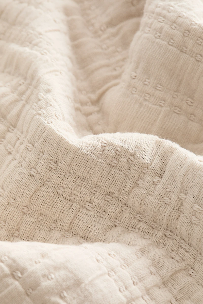 Housse de coussin matelassée en coton