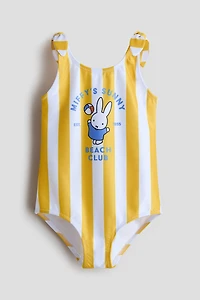 Costume de bain imprimé avec détails noués