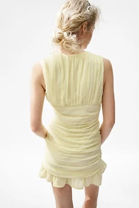 Robe en mousseline à effet drapé