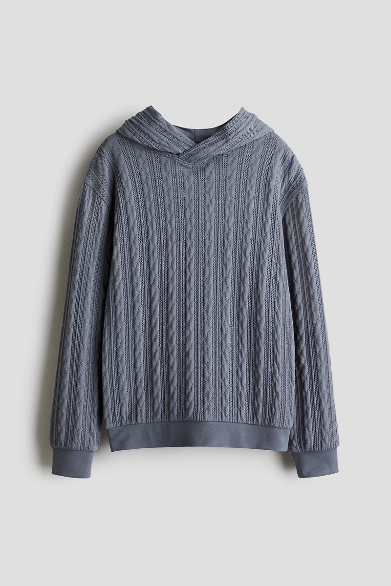 Kangourou façon tricot torsadé