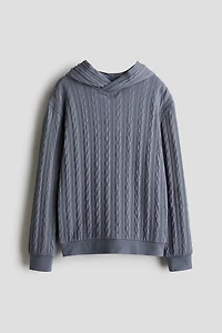 Kangourou façon tricot torsadé