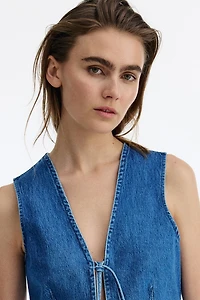 Gilet sans manches en denim avec liens à nouer