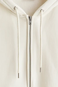 Veste à fermeture éclair ample capuche