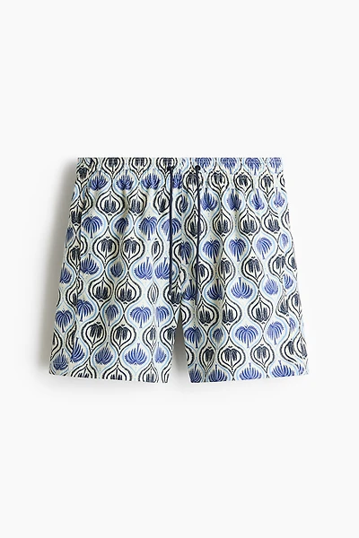 Patterned swim shorts