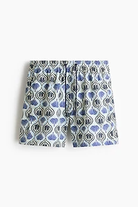 Patterned swim shorts