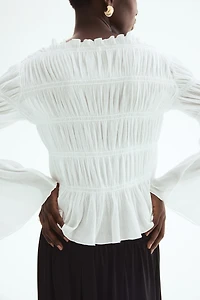 Haut nid d'abeille à encolure bateau