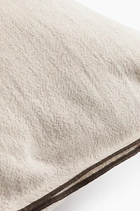 Housse de coussin en lin mélangé