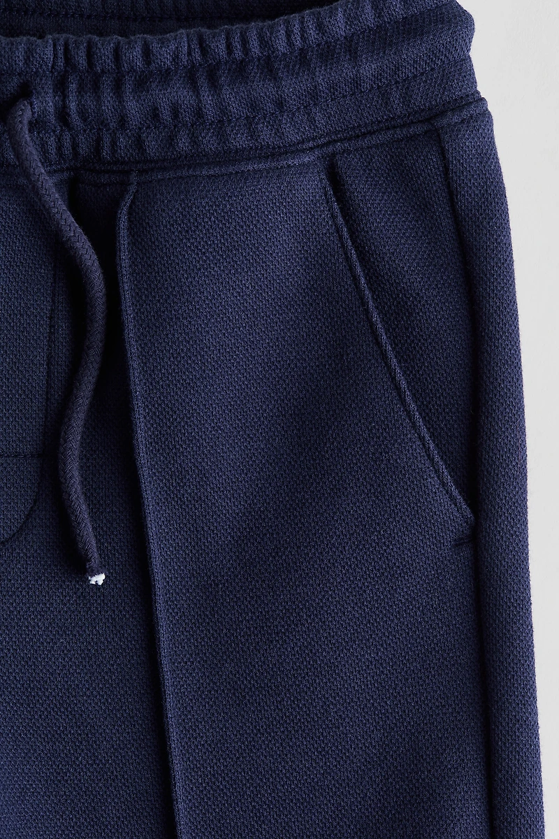 Short en piqué avec cordon de serrage