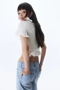Flounced blouse