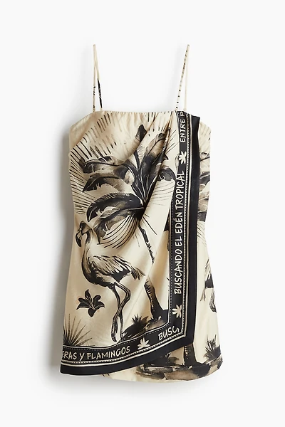 Robe bandeau à effet drapé