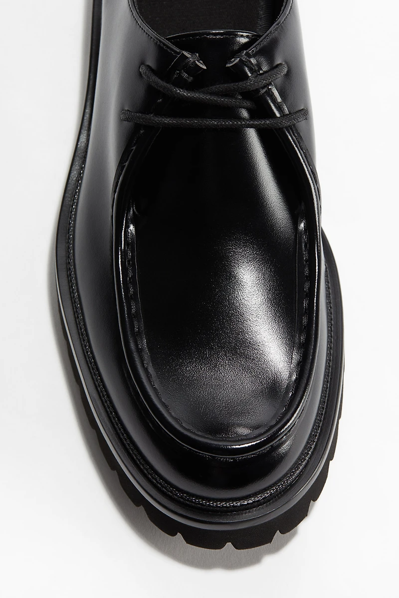 Chaussures rondelettes