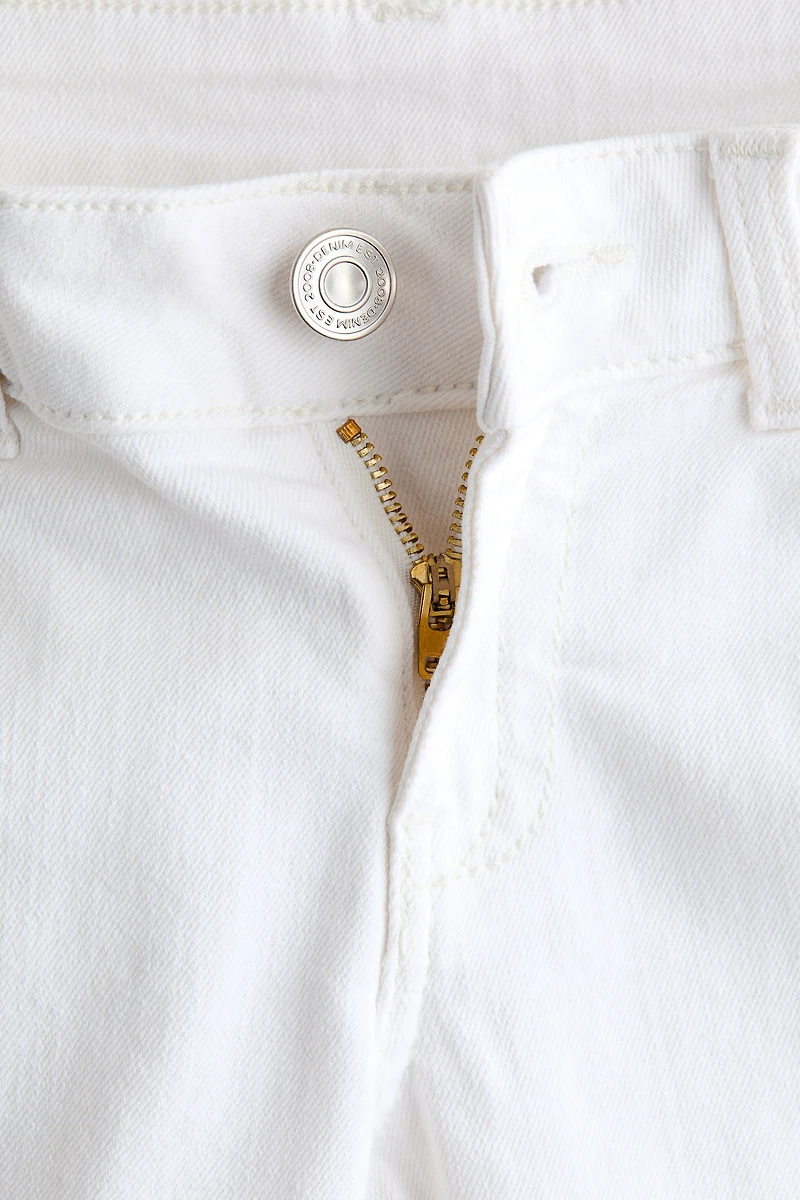 Jean taille basse jambes évasées