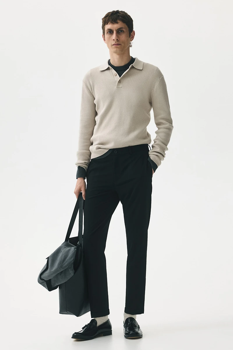 Polo près du corps en tricot côtelé