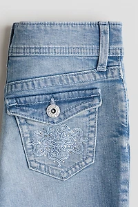 Jean taille basse évasé