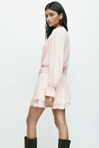 Robe drapée avec détail noué