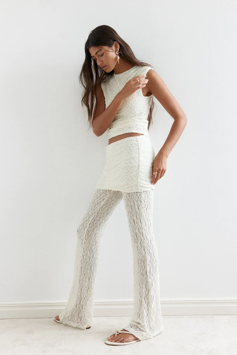 Pantalon en dentelle avec jupe superposée