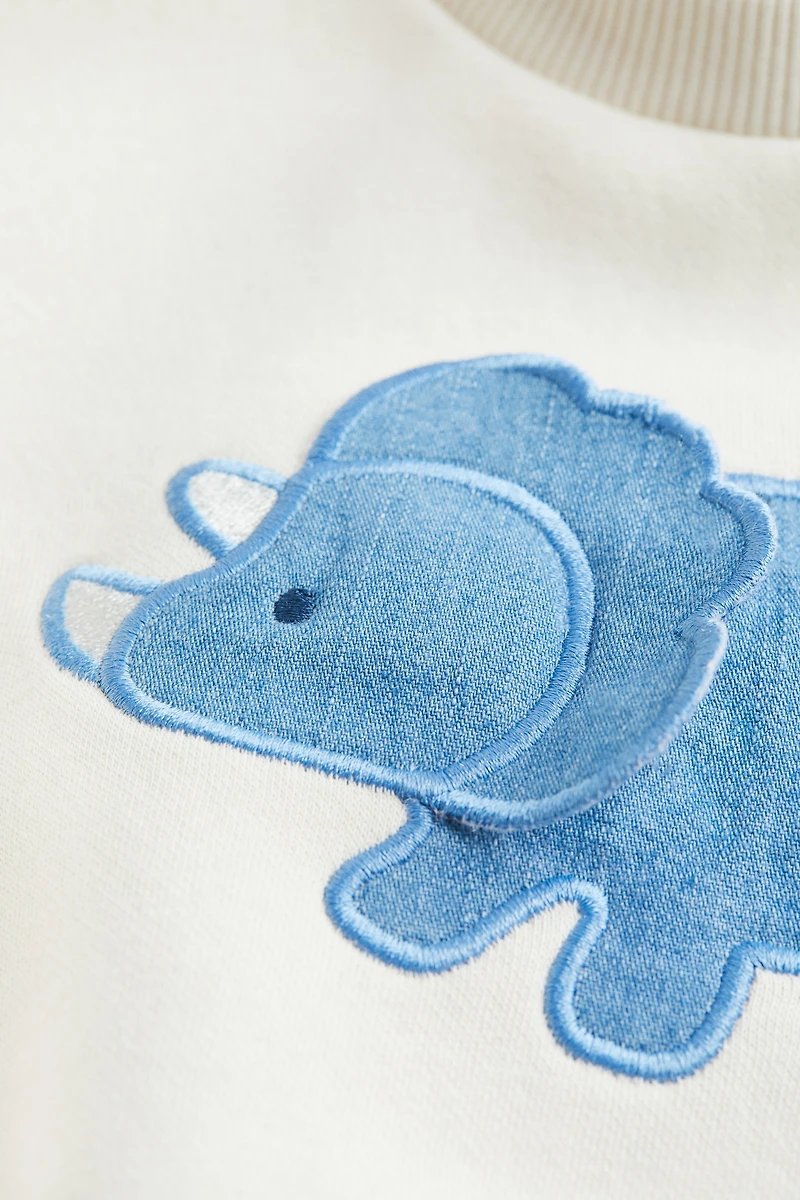 Sweat à l'intérieur brossé avec motif