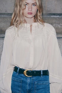 Blouse à col volants en coton