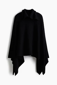 Cape en tricot côtelé