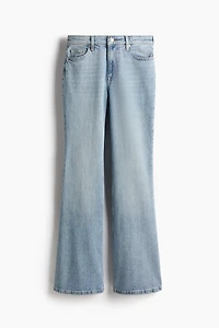 Jean évasé coupe galbée taille haute