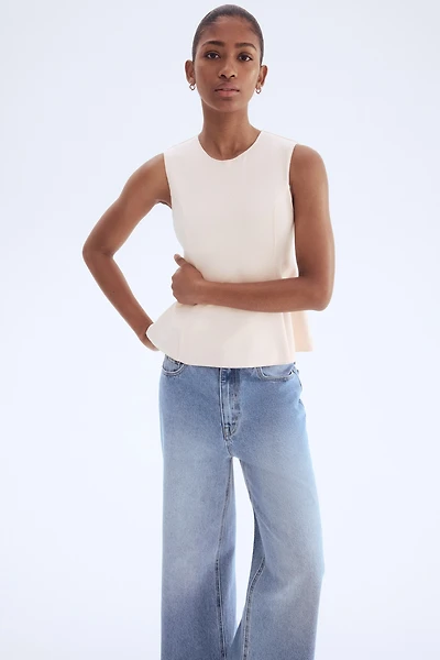 Interlock Sleeveless Peplum Top