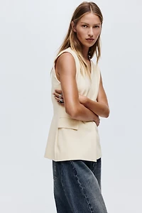 Long chandail sans manches