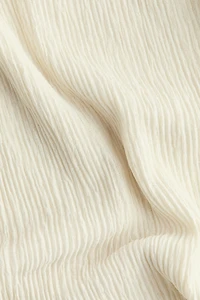 Haut avec détail style écharpe