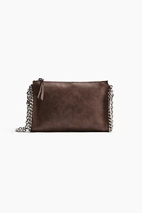 Sac à bandoulière à l'aspect usé