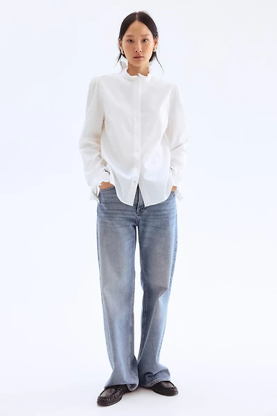 Blouse à col volant