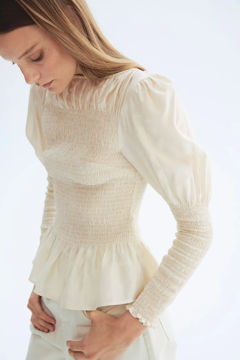 Blouse smockée en viscose mélangée