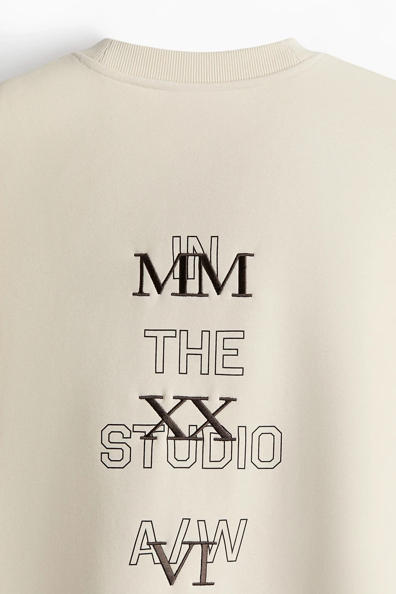 Chandail ample en molleton imprimé