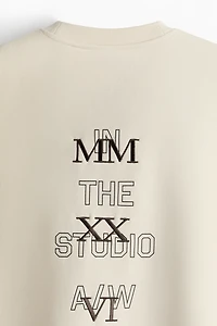 Chandail ample en molleton imprimé