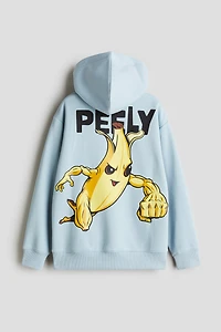 Veste à capuchon fermeture éclair avec motifs