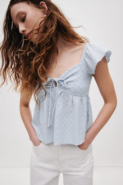 Blouse en jersey pointelle