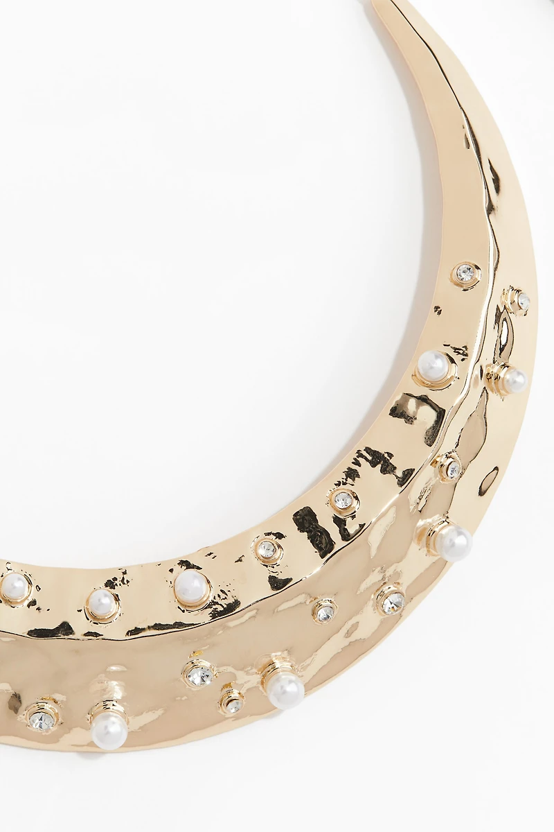 Collier rigide orné de strass